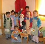 Baba Noel (Santa Claus) visits the Gan