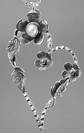 Blooming heart silver pendant